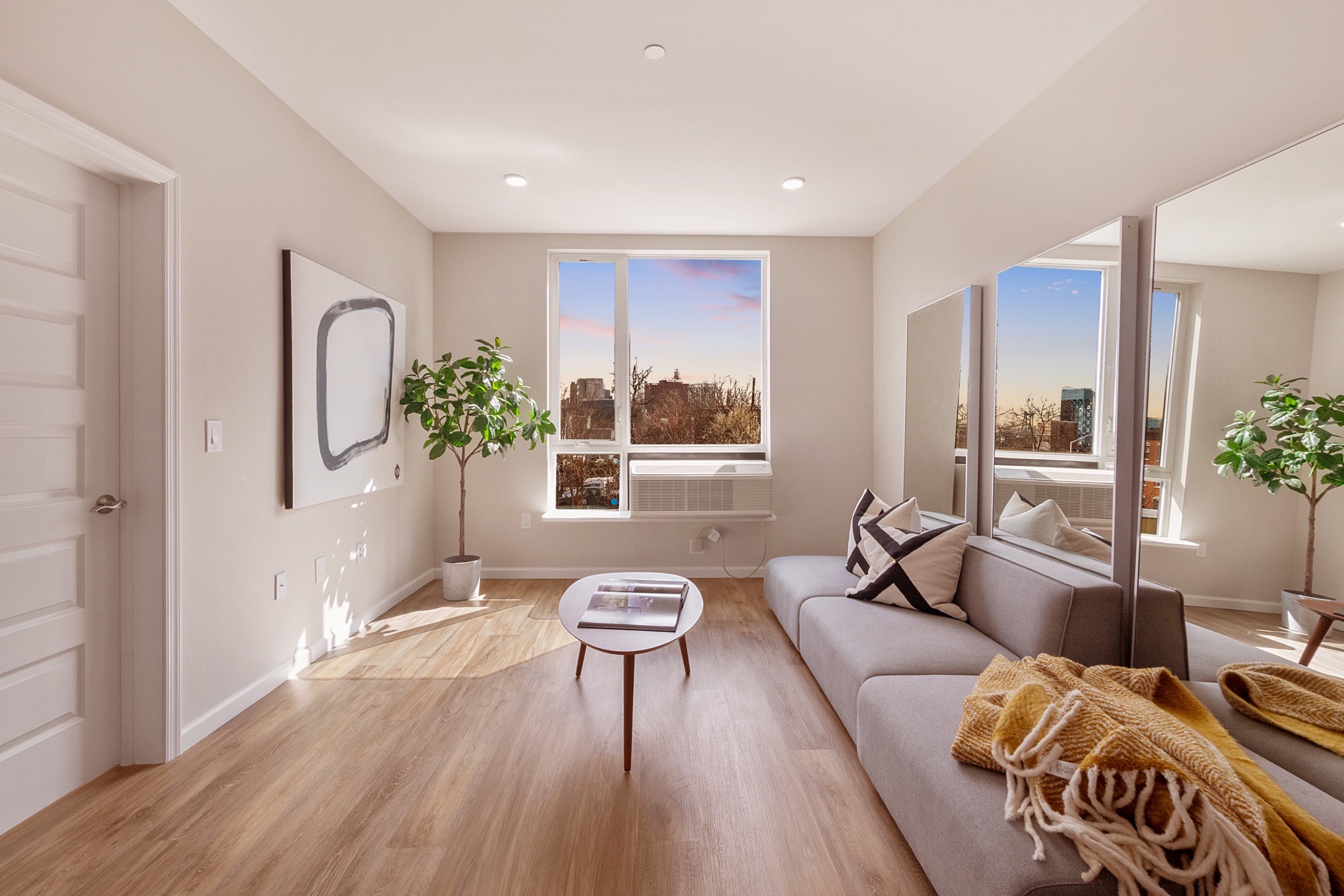 Sunlit urban living room at sunset